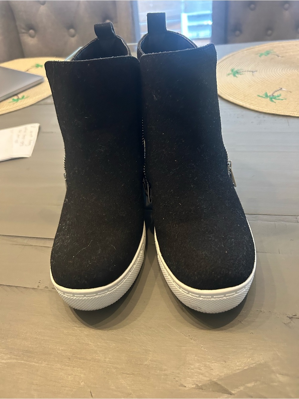 black suede hidden wedge sneaker bootie with a silver side zipper